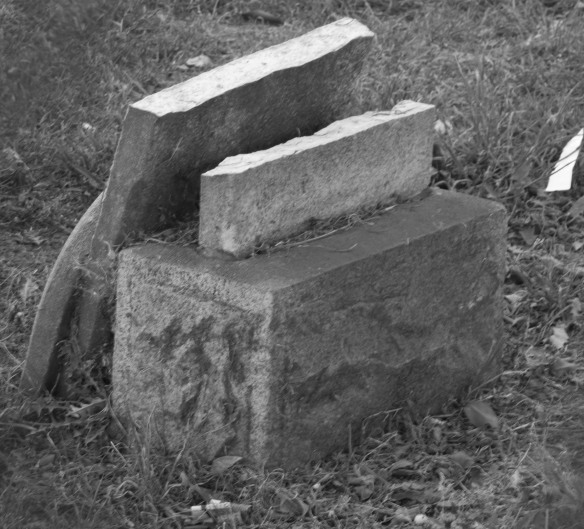 Broken headstone at evergreen cemetery